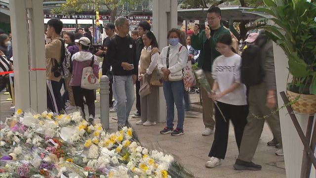 Residents mourning fire deaths Residents mourning fire deaths