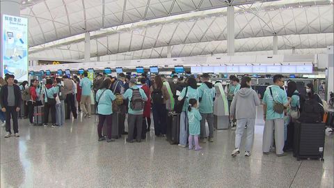 Busy airport as Hong Kongers leave for Christmas
