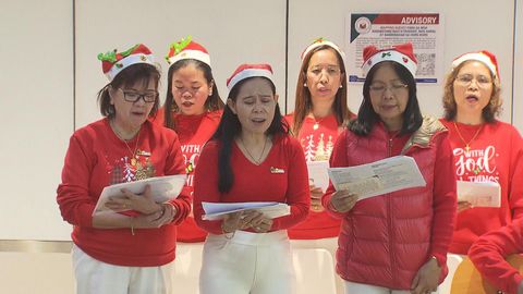 Filipinos gather for Christmas mass as they heal from Tai Po fire