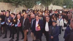 Christians in Gaza, Lebanon celebrate Christmas, German swimmers take holiday plunge