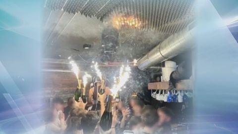 Authorities say sparklers atop champagne bottles likely caused Swiss bar fire