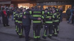 Firefighters who responded to the New Year fire at a Swiss ski resort, applauded