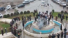 Kurdish forces give up provinces' control to Syrian government