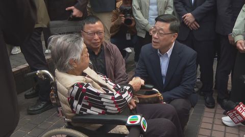 Chief Executive John Lee visits residents of Yau Ma Tei