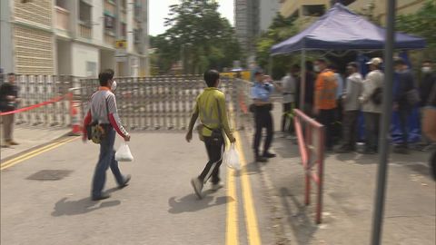 Workers show understanding toward tightened security measures in Wang Fuk Court