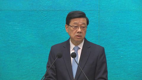 李家超稱中東局勢動盪資金續流入本港　長遠有利香港金融中心發展