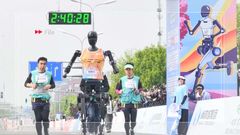 Humans vs humanoid robots in Beijing half-marathon in April