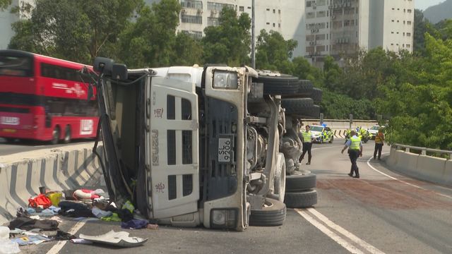 A truck crashed into a car in Tuen Mun leaving the truck driver unconscious