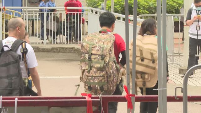 Wang Fuk Court residents continue to return to their fire-hit home to collect belongings