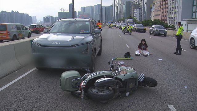 Motorcyclist and passenger hurt in collision on Kwun Tong bypass