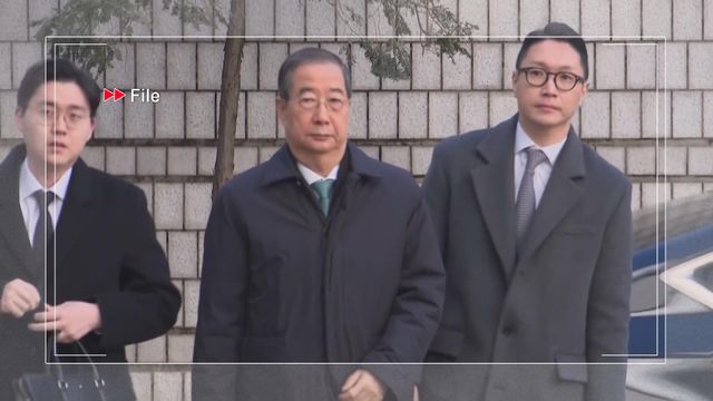 South Korea Ex-PM Han Duck-soo has sentence cut to 15 years