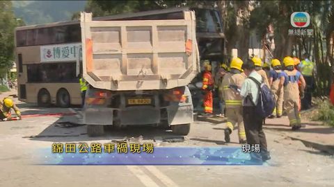 泥頭車錦田公路與巴士相撞 泥頭車司機被困至少兩乘客傷